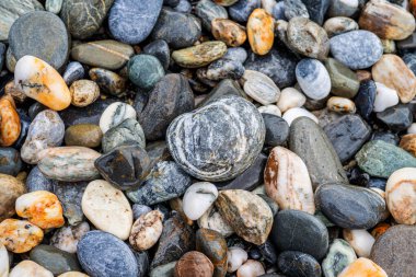 Kırsal taşlar, paslanmış dokular, renkli ve ilginç arka planlar ve büyüleyici dokular, web tasarımı ve soyut arkaplanlar için kullanılır.