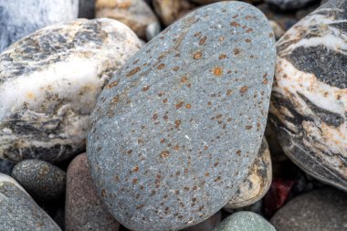 Kırsal taşlar, paslanmış dokular, renkli ve ilginç arka planlar ve büyüleyici dokular, web tasarımı ve soyut arkaplanlar için kullanılır.