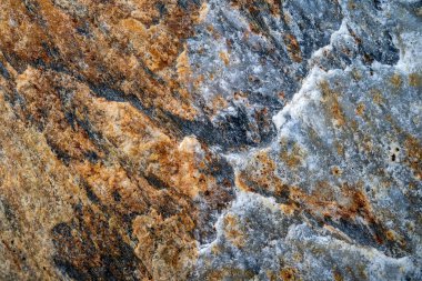 Kırsal taşlar, paslanmış dokular, renkli ve ilginç arka planlar ve büyüleyici dokular, web tasarımı ve soyut arkaplanlar için kullanılır.