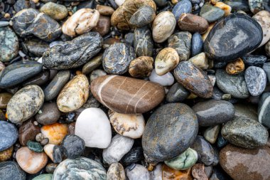 Kırsal taşlar, paslanmış dokular, renkli ve ilginç arka planlar ve büyüleyici dokular, web tasarımı ve soyut arkaplanlar için kullanılır.