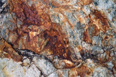 Kırsal taşlar, paslanmış dokular, renkli ve ilginç arka planlar ve büyüleyici dokular, web tasarımı ve soyut arkaplanlar için kullanılır.