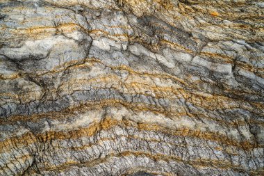 Kırsal taşlar, paslanmış dokular, renkli ve ilginç arka planlar ve büyüleyici dokular, web tasarımı ve soyut arkaplanlar için kullanılır.