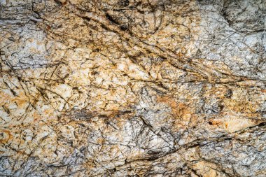 Kırsal taşlar, paslanmış dokular, renkli ve ilginç arka planlar ve büyüleyici dokular, web tasarımı ve soyut arkaplanlar için kullanılır.