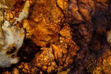 Kırsal taşlar, paslanmış dokular, renkli ve ilginç arka planlar ve büyüleyici dokular, web tasarımı ve soyut arkaplanlar için kullanılır.