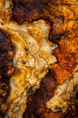 Kırsal taşlar, paslanmış dokular, renkli ve ilginç arka planlar ve büyüleyici dokular, web tasarımı ve soyut arkaplanlar için kullanılır.