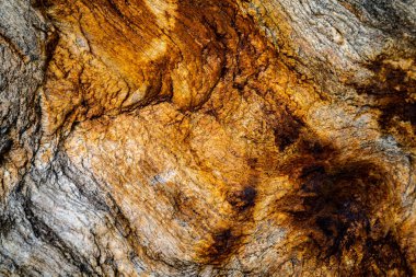 Kırsal taşlar, paslanmış dokular, renkli ve ilginç arka planlar ve büyüleyici dokular, web tasarımı ve soyut arkaplanlar için kullanılır.