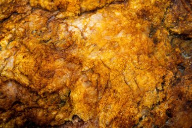 Kırsal taşlar, paslanmış dokular, renkli ve ilginç arka planlar ve büyüleyici dokular, web tasarımı ve soyut arkaplanlar için kullanılır.