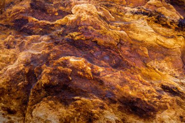 Kırsal taşlar, paslanmış dokular, renkli ve ilginç arka planlar ve büyüleyici dokular, web tasarımı ve soyut arkaplanlar için kullanılır.