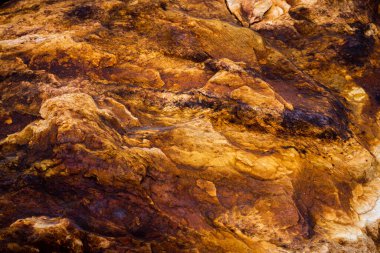 Kırsal taşlar, paslanmış dokular, renkli ve ilginç arka planlar ve büyüleyici dokular, web tasarımı ve soyut arkaplanlar için kullanılır.