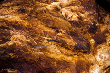 Kırsal taşlar, paslanmış dokular, renkli ve ilginç arka planlar ve büyüleyici dokular, web tasarımı ve soyut arkaplanlar için kullanılır.