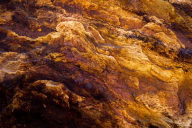 Kırsal taşlar, paslanmış dokular, renkli ve ilginç arka planlar ve büyüleyici dokular, web tasarımı ve soyut arkaplanlar için kullanılır.