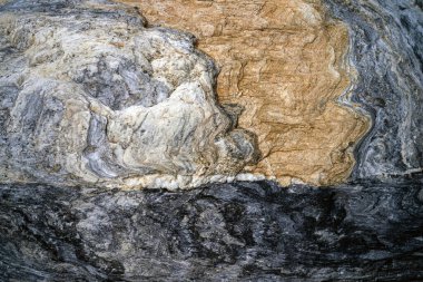 Kırsal taşlar, paslanmış dokular, renkli ve ilginç arka planlar ve büyüleyici dokular, web tasarımı ve soyut arkaplanlar için kullanılır.