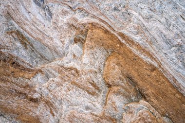 Kırsal taşlar, paslanmış dokular, renkli ve ilginç arka planlar ve büyüleyici dokular, web tasarımı ve soyut arkaplanlar için kullanılır.