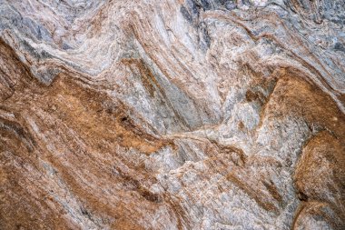 Kırsal taşlar, paslanmış dokular, renkli ve ilginç arka planlar ve büyüleyici dokular, web tasarımı ve soyut arkaplanlar için kullanılır.