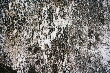 Lekeli yıpranmış bir duvar