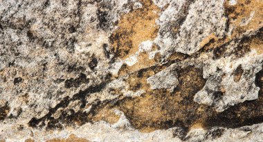 Köhne taş, aşınmış doku veya web tasarımı ve soyut arkaplan için grunge taş dokusu