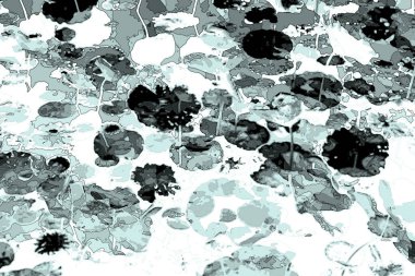 Nilüfer yaprakları ve nilüfer yapraklarıyla sunulan zarif desenli tasarım.