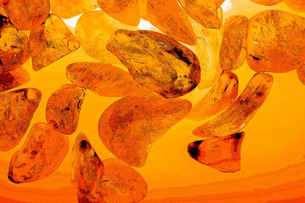 Agate crystal cross section background. Natural translucent agate crystal surface slice. Macro close-up of ore, abstract structure