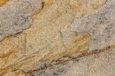 Kırsal taşlar, paslanmış dokular, renkli ve ilginç arka planlar ve büyüleyici dokular, web tasarımı ve soyut arkaplanlar için kullanılır.