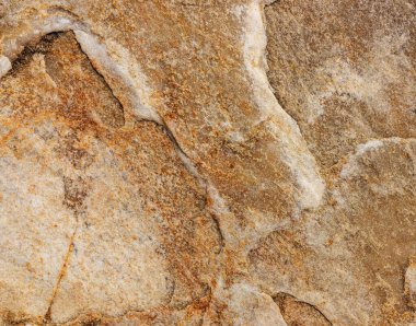 Kırsal taşlar, paslanmış dokular, renkli ve ilginç arka planlar ve büyüleyici dokular, web tasarımı ve soyut arkaplanlar için kullanılır.