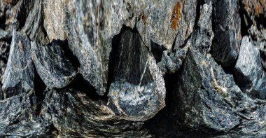 Kırsal taşlar, paslanmış dokular, renkli ve ilginç arka planlar ve büyüleyici dokular, web tasarımı ve soyut arkaplanlar için kullanılır.