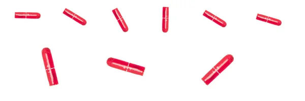 Colorful tampons isolated on the white background, a plug of soft material inserted into the vagina to absorb menstrual blood — Foto Stock