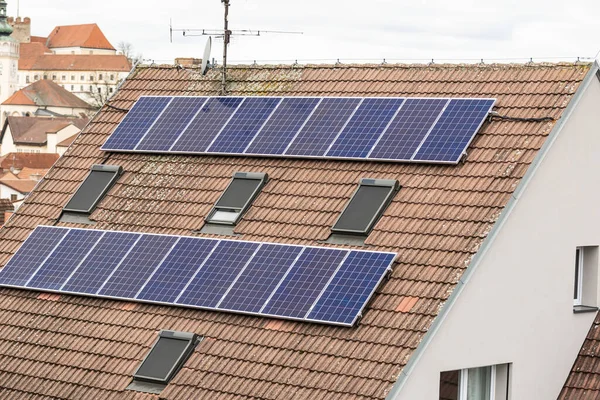 Solar panels on the roof of the family house, alternative energy, ecology concept — Stock Photo, Image
