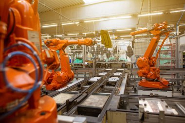 Industrial automatic robot arms in the production line, inteligent factory industry clipart