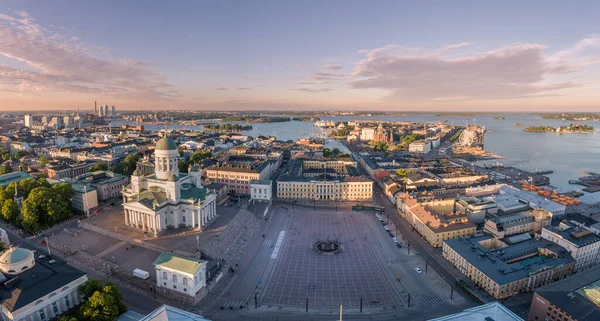 Helsinki Cityscape. Finland. Helsinki Cathedral, Old Town and Harbor in Background. Sunset Colors. Drone Point of View.