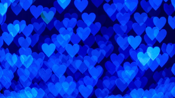 Fondo Bokeh Con Corazones Azules Sobre Fondo Negro Concepto Amor — Foto de Stock