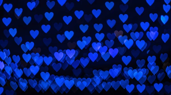 Fondo Bokeh Con Corazones Azules Sobre Fondo Negro Concepto Amor — Foto de Stock