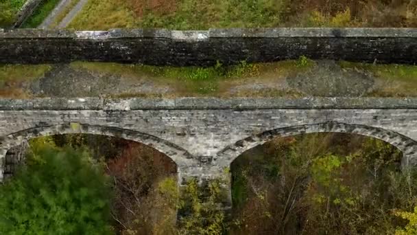 The old Austrian stone railway bridge viaduct in Ukraine. — Stock Video