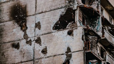 Irpin, Ukraine - May 22, 2022: the consequences of the aggression of the Russian army: shot, bombed, burned apartments and houses. High quality photo.
