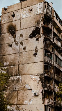 Irpin, Ukraine - May 22, 2022: the consequences of the aggression of the Russian army: shot, bombed, burned apartments and houses. High quality photo.