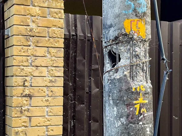 A shot electric pole. The concept of the destruction of civil infrastructure during war