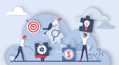 Etkili işbirliği ve takım çalışması. Yapboz parçaları üzerinde çalışan bir grup çalışan.