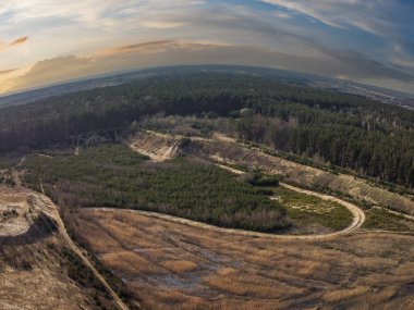 A fairy-tale landscape illuminated by the setting sun.