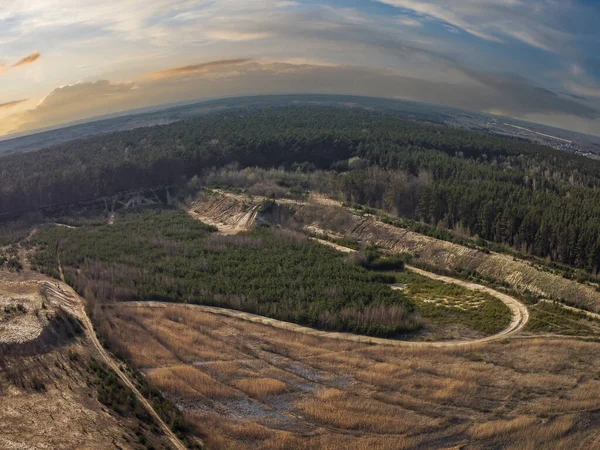 A fairy-tale landscape illuminated by the setting sun.