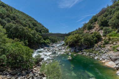 The Yuba River in California and its rocky bed.