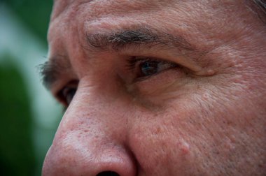 aged man eyes looking. cropped view of face.