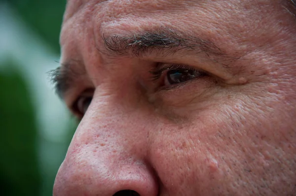 senior man eyes looking. cropped view of face.