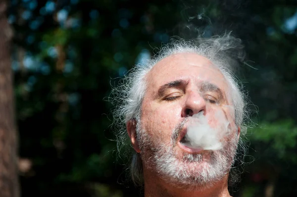 Senior Man Enjoying Smoking Summer Vacation Suntan Smoke Copy Space — Stockfoto