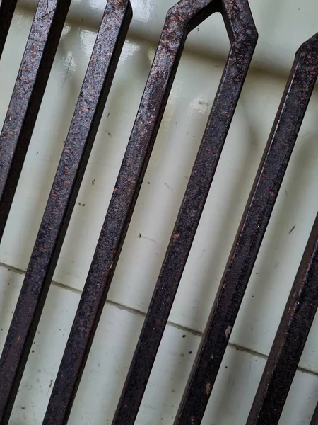 Background White Wooden Door Front Brown Iron Fence Security — Stock Photo, Image