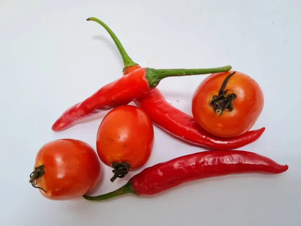 Big Red Chilies Green Handles Big Red Chilies White Background — Foto de Stock