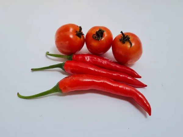 Big Red Chilies Green Handles Big Red Chilies White Background — ストック写真