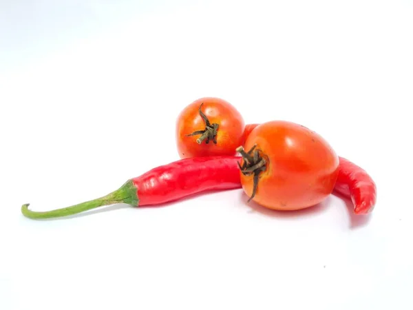 Big Red Chilies Green Handles Big Red Chilies White Background — стоковое фото