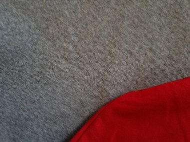 Soyut kumaş arka plan. Gri giysiler kırmızı ile birleştirilmiş.