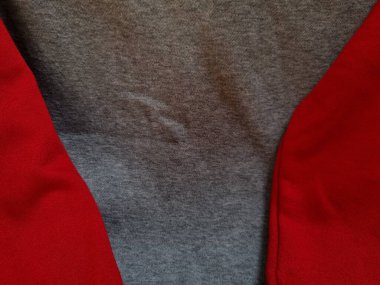 Soyut kumaş arka plan. Gri giysiler kırmızı ile birleştirilmiş.