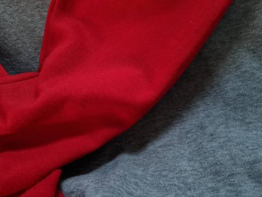 Background photo of abstract cloth textured gray clothes combined with red