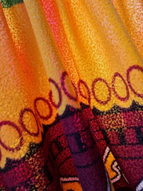 Sarı battaniye desenli soyut kumaş arkaplan ve diğer renk kombinasyonları